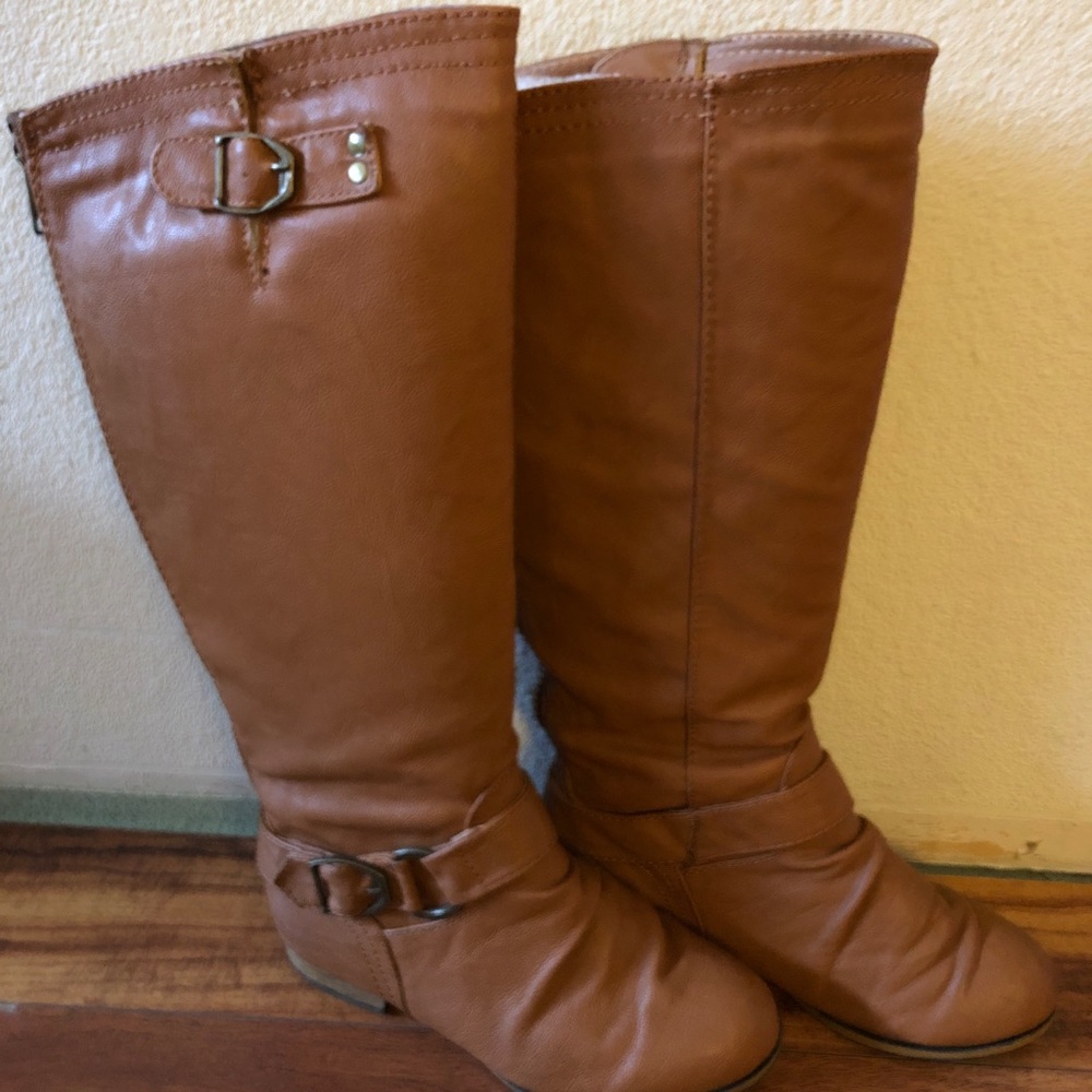 Light Brown tall boots.  Size 5 zipper in back.